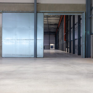 An interior shot of a sliding door inside a warehouse