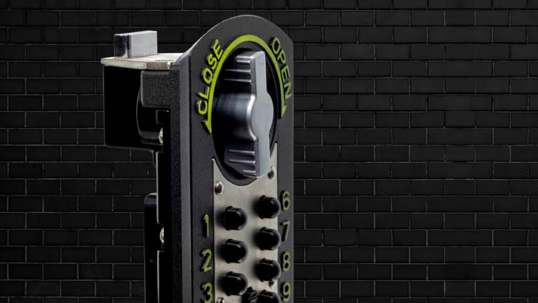 Close-up of Keyguard Digital XL keypad with large bright green numbers and open/close dial for easy visibility.